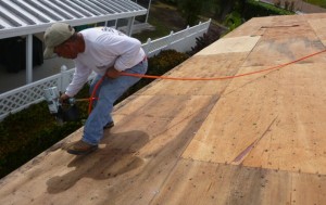 Re-nailing plywood for new metal roofing